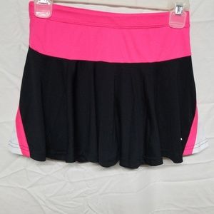 A Champion skirt with shorts underneath.